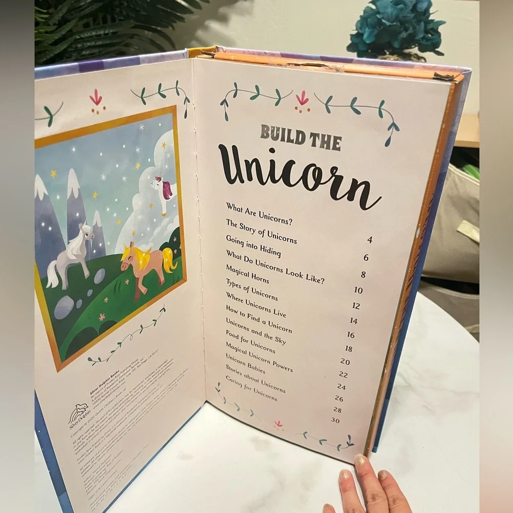 Build the Unicorn Kids Building Set, reading book, and Lear